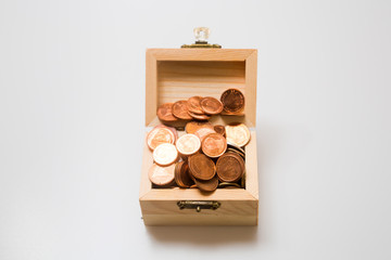 coins in the chest. concept for business and saving