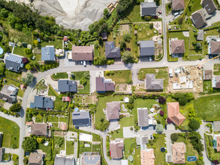 Aerial view of rural village in Switzerland with building and rooftop from above on a beautiful...