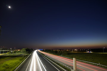 Fototapeta na wymiar Gorgeous long exposure view at a highway A14 (Autobahn) in Leipzig, Germany