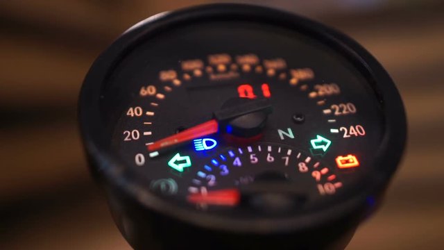 Designer speedometer with flashing arrows, safe driving concept, no overspeed