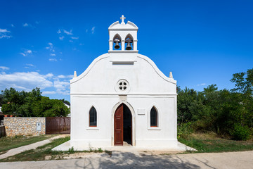 Fototapeta na wymiar Generic small old church on Silba Island in Croatia.