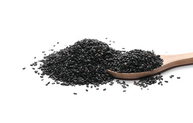 Black organic sesame seeds in wooden spoon isolated on white background