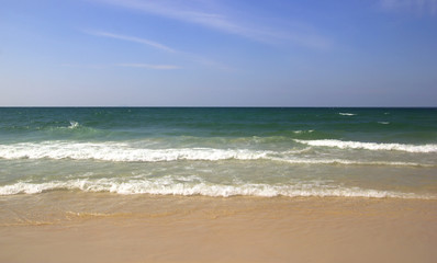 Sea view from tropical beach with sunny sky