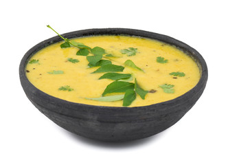 Rajasthani And Gujarati Traditional Cuisine Kadhi - Indian Vegetarian Curry Made of Buttermilk And Chick Pea Flour. Cuisine on White Background
