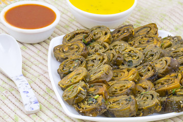 Indian Spicy Food Patra Also Called Paatra, Alu Vadi or Patrode is a Veg Dish in Maharashtra or...
