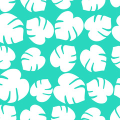 Seamless vector background with decorative leaves. Texture of palm leaves. Textile rapport.