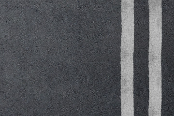Fototapeta premium Asphalt highway texture with two white stripes