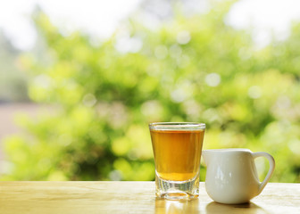 tea drinks with nature tree bokeh sunlights backgrounds