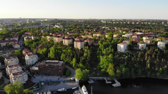 Aerial footage of the Stockholm island Stora Essingen and its western shore
