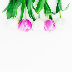 Floral composition with tulips flowers on white background. Summer time flowers. Flat lay, Top view.