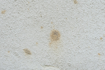 Wall fragment with scratches and cracks