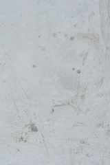 Wall fragment with scratches and cracks