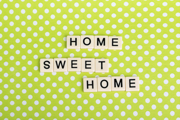 Game tiles forming family concept phrase