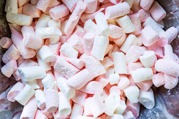 Colorful marshmallows close up in a bowl