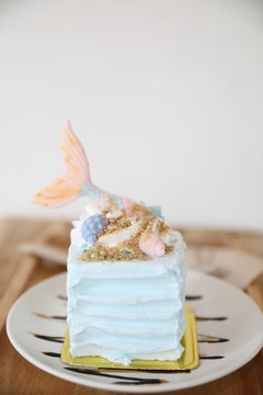 Fancy Mermaid Cake On Wood Background