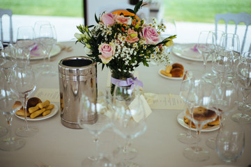 seat on restaurant table prepared for wedding party gala dinner