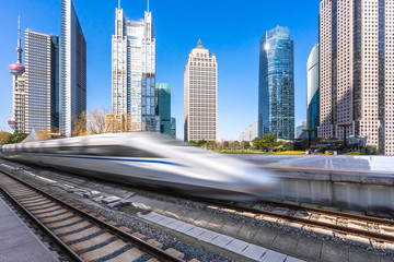 high speed train with city skyline in shanghai