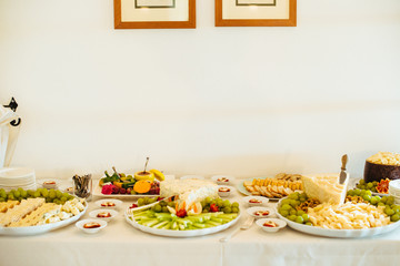 restaurant table prepared with tasting dishes for an aperitif for a wedding party gala dinner