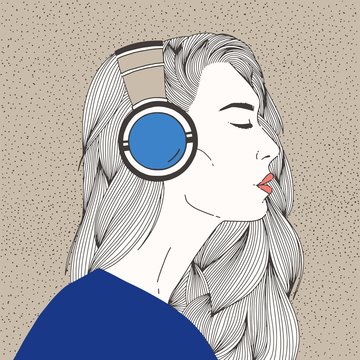 Portrait of beautiful long-haired young woman with closed eyes wearing headphones
