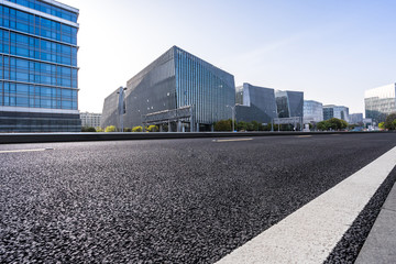 empty road with panoramic city skyline