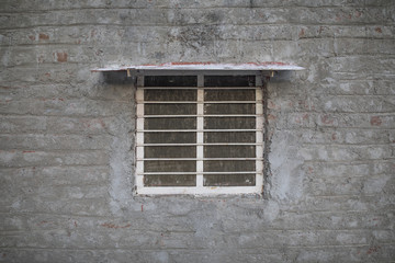 Fototapeta na wymiar Close window in Brick Wall