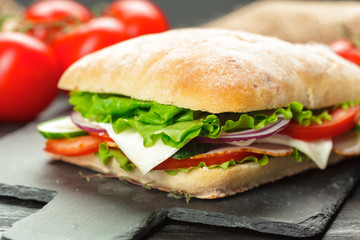 sandwich on a wooden table