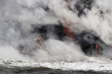 Fototapeta na wymiar Lava entering the ocean, Big Island, Hawaii