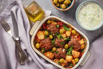 Kofte , beef meatballs, baked with vegetables.