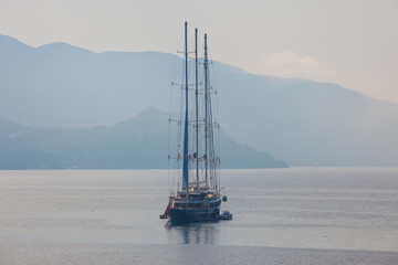 Fototapeta premium Yacht in the sea, Seascape and the mountains of Turkey Marmaris
