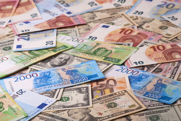 Fototapeta na wymiar Dollar, euro, ruble banknotes