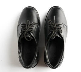 black patent leather men shoes against white