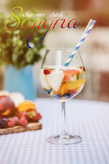 Top view of summer dinks, fruit cocktails on white wood table with berries, mint leaves
