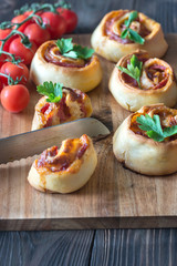 Pizza rolls on the wooden board
