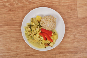 Cauliflower mixture with curry and rice on a table