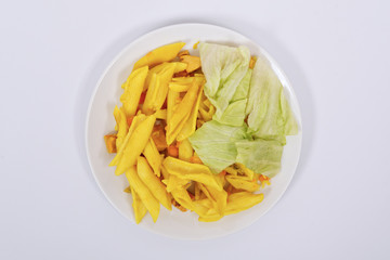 Baked pasta with curry on a white