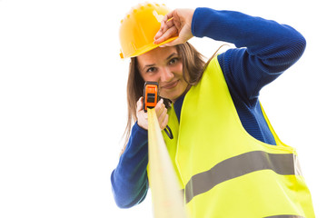 Young female architect holding measuring tape.