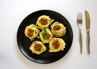 Spaghetti dish on a white background