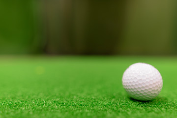 Golf Balls On Green Surface