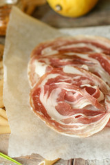 Pancetta (dried pork bacon) Italian cuisine. food background