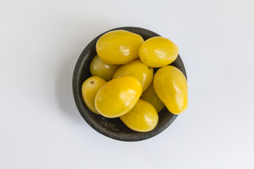 Colorful cherry tomatoes isolated on white for your design