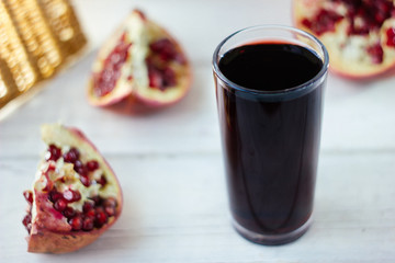 Fresh organic juice made from pomegranate seeds.