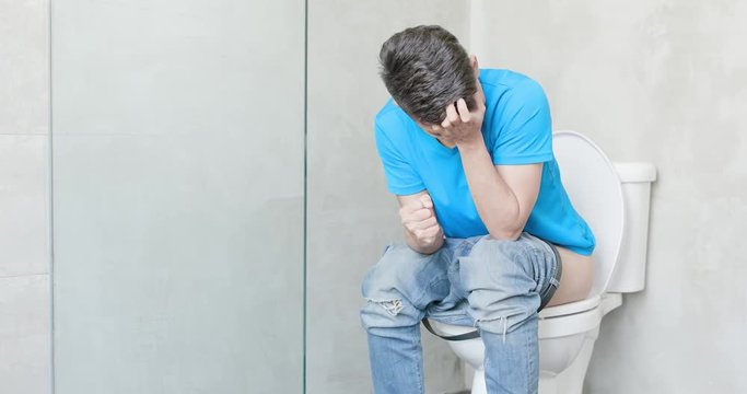 man feel pain with constipation