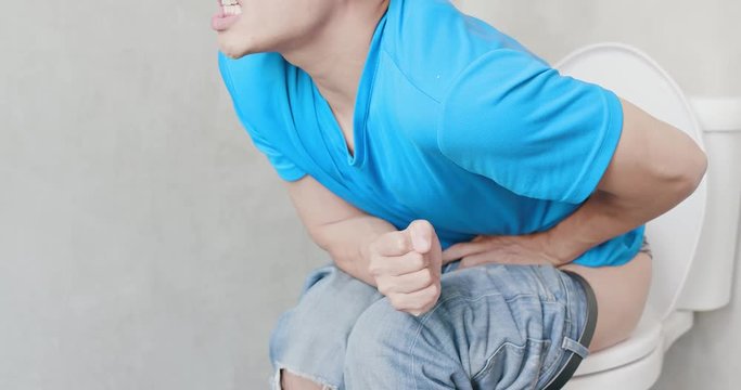 man feel pain with constipation