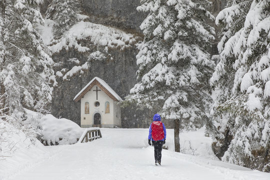 A girl is walking inside the Sottoguda Serrai Gorge at the foot of Marmolada (Sottoguda, Rocca Pietore, Belluno province, Veneto, Italy, Europe)