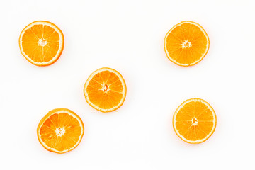Citrus pattern. Orange round slices composition on white background top view