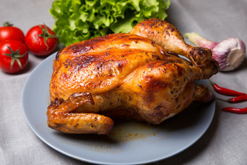 Chicken baked whole. Selective focus, close-up.