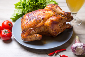Chicken baked whole. Selective focus, close-up.