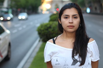 Ethnic woman outdoors close up 