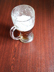 a glass of beer on the table