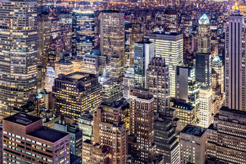 Aerial view of Manhattan skyscrapers by night